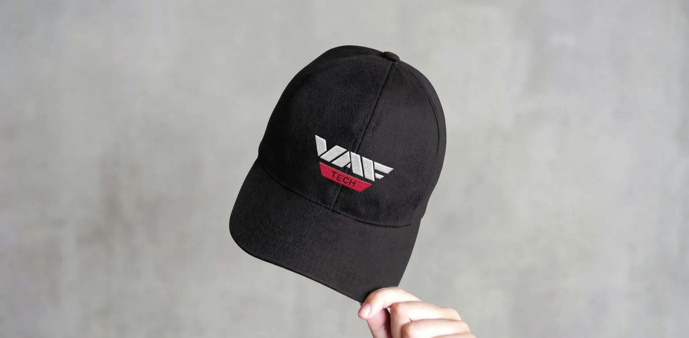 A black cap with the VAF Tech logo